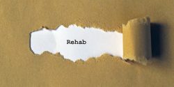 A piece of paper that says 'rehab' on it