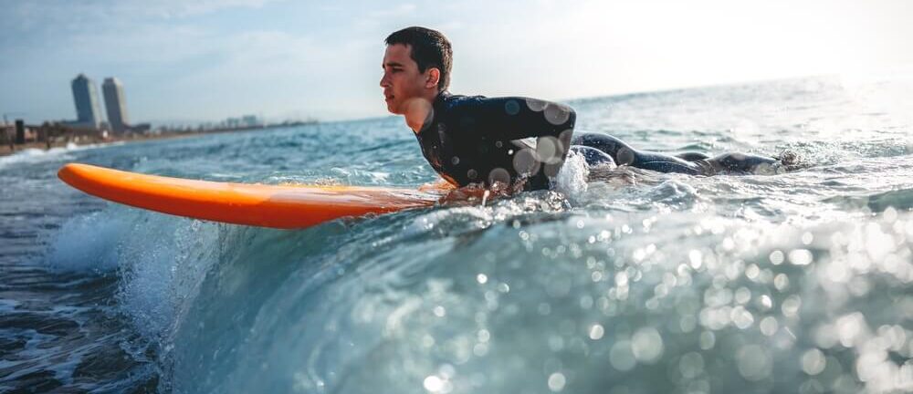 Hawaii Man Overcomes Gambling Addiction by Offering Free Surfing Lessons