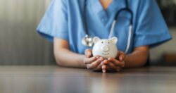 A person wearing medical scrubs holds a piggy bank. Learn more about getting addiction treatment you can afford in this step-by-step guide.