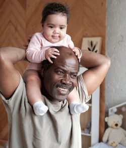 BIPOC man and his granddaughter