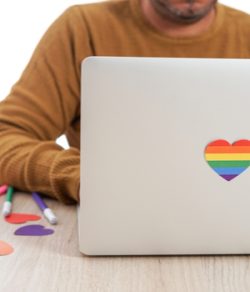 laptop with gay pride sticker